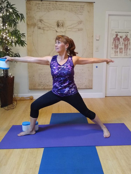 Patty in Warrior Yoga Pose